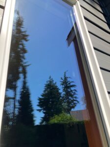 Window located in Seattle, WA after being cleaned by Chinook Services employee