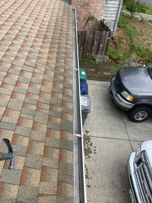 Empty rain gutter. Edmonds house gutter cleaning service