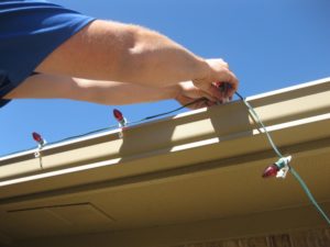 Custom christmas lights installed on gutter exterior with heavy duty bulb clips. Bothell area home.