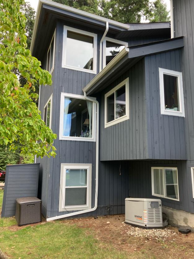 Window cleaning a three story house in Granite Falls, WA