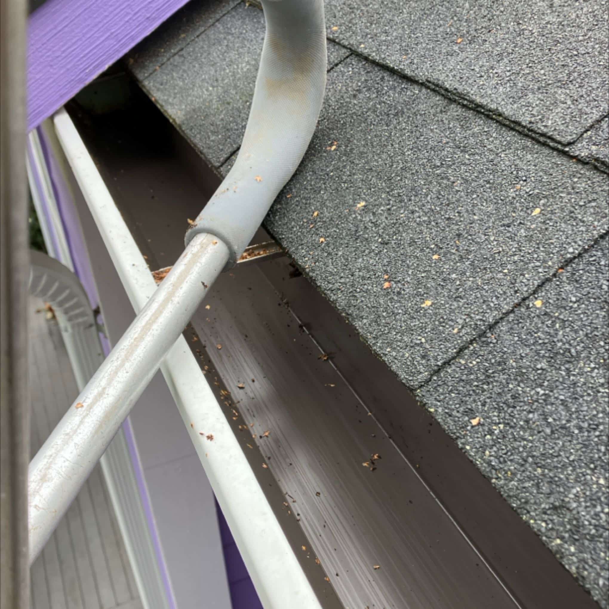 gutter cleaning after debris removed and clog removed