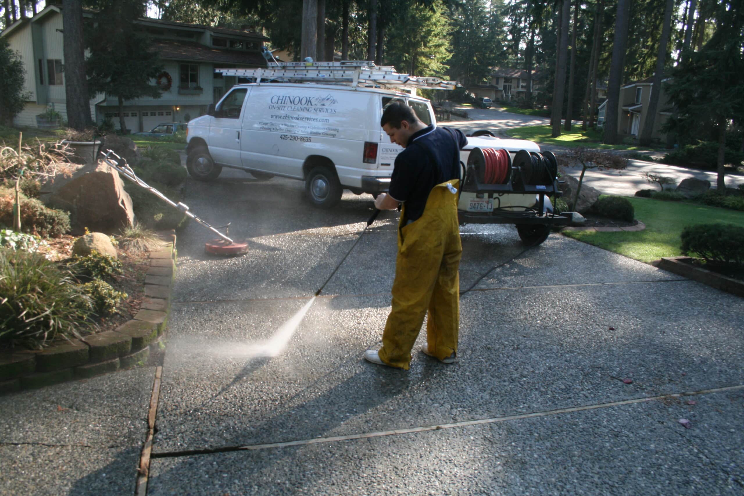 Pressure washing concrete driveway and patio in Bellevue, WA