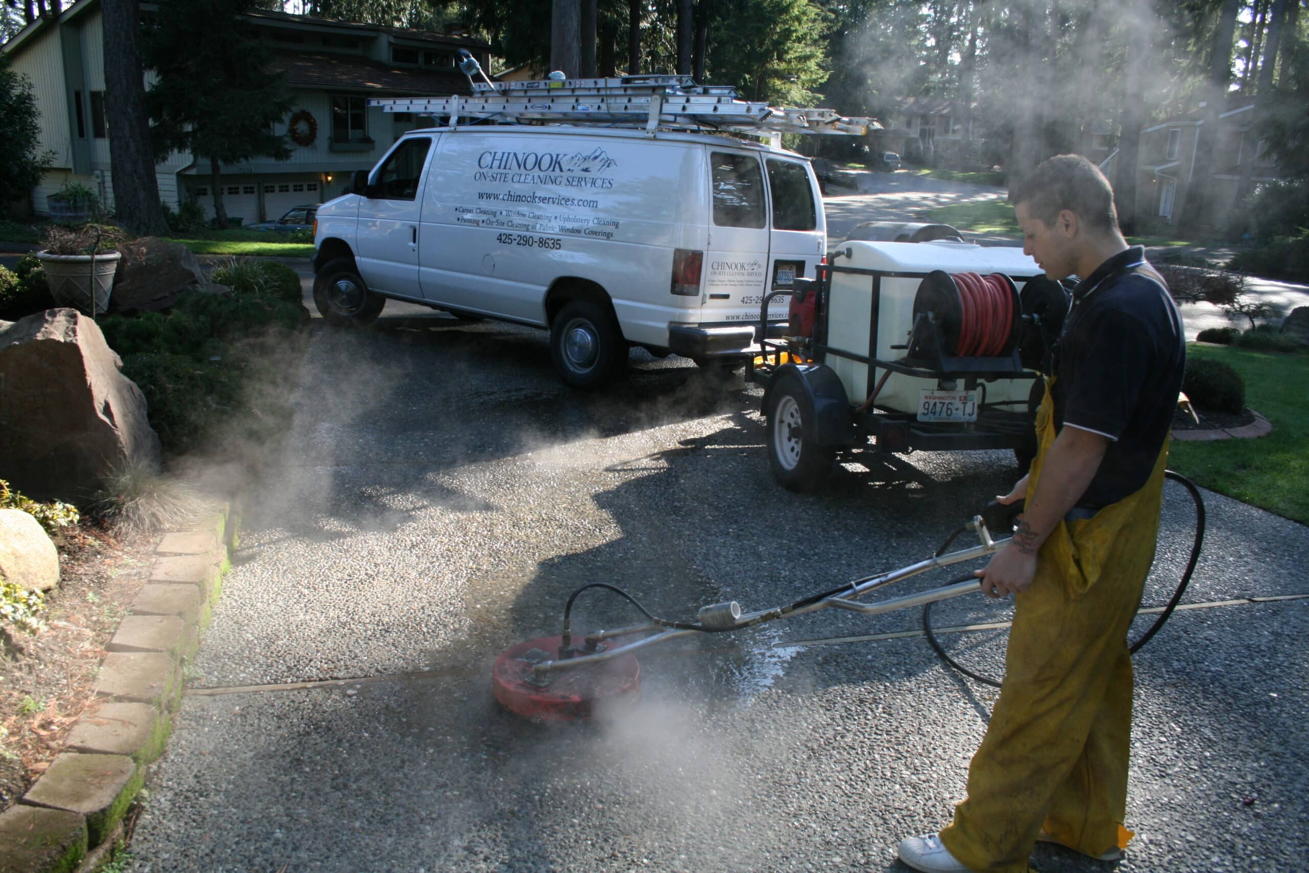Using surface disc pressure washing tool on driveway in Cottage Lake