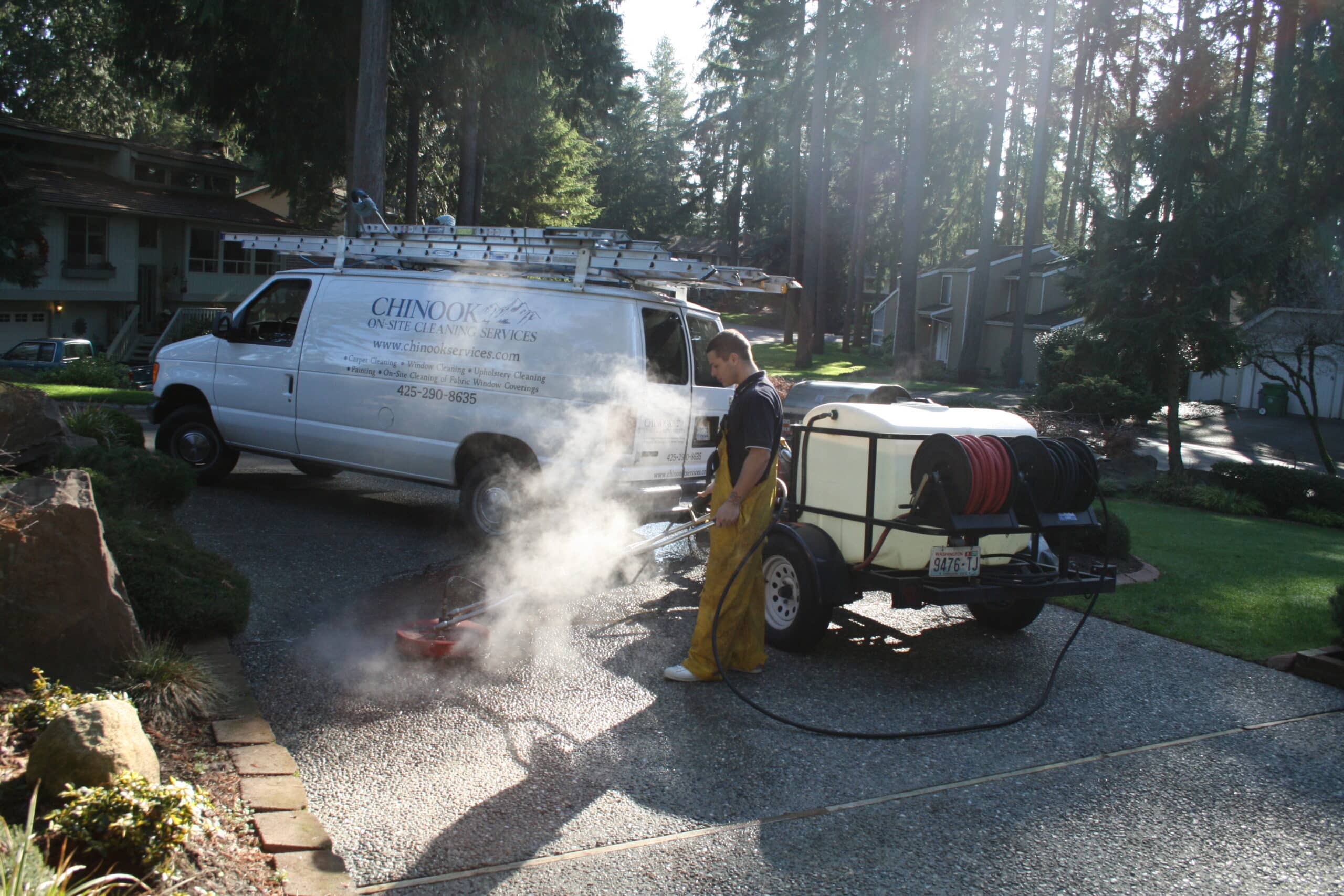 Pressure washing cment patio in Klahanie