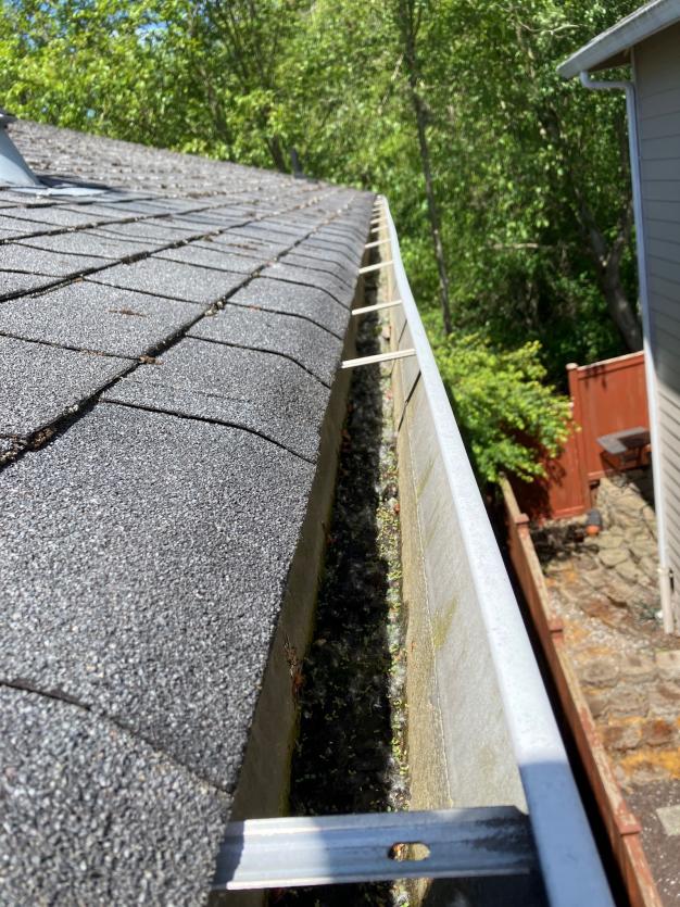 Close up image of gutter after cleaning in Mill Creek, WA