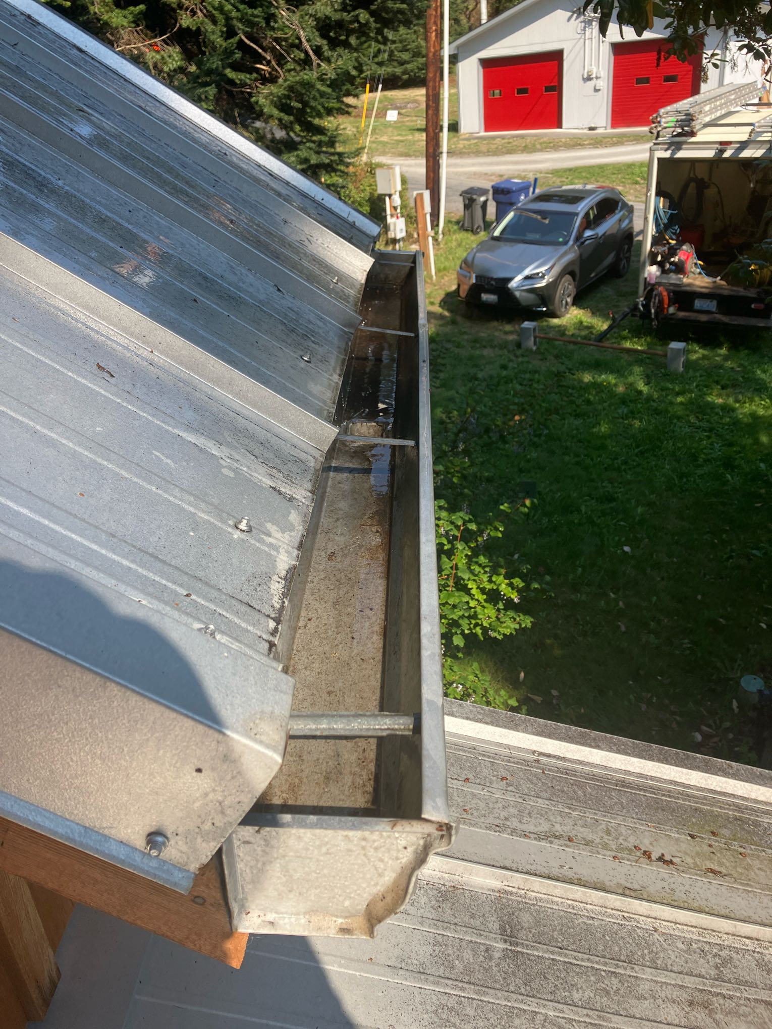 Gutter after being cleaned in Mountlake Terrace, WA