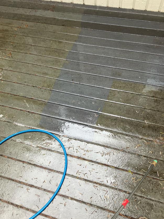 Newcastle pressure washing company cleaning a deck using soft wash