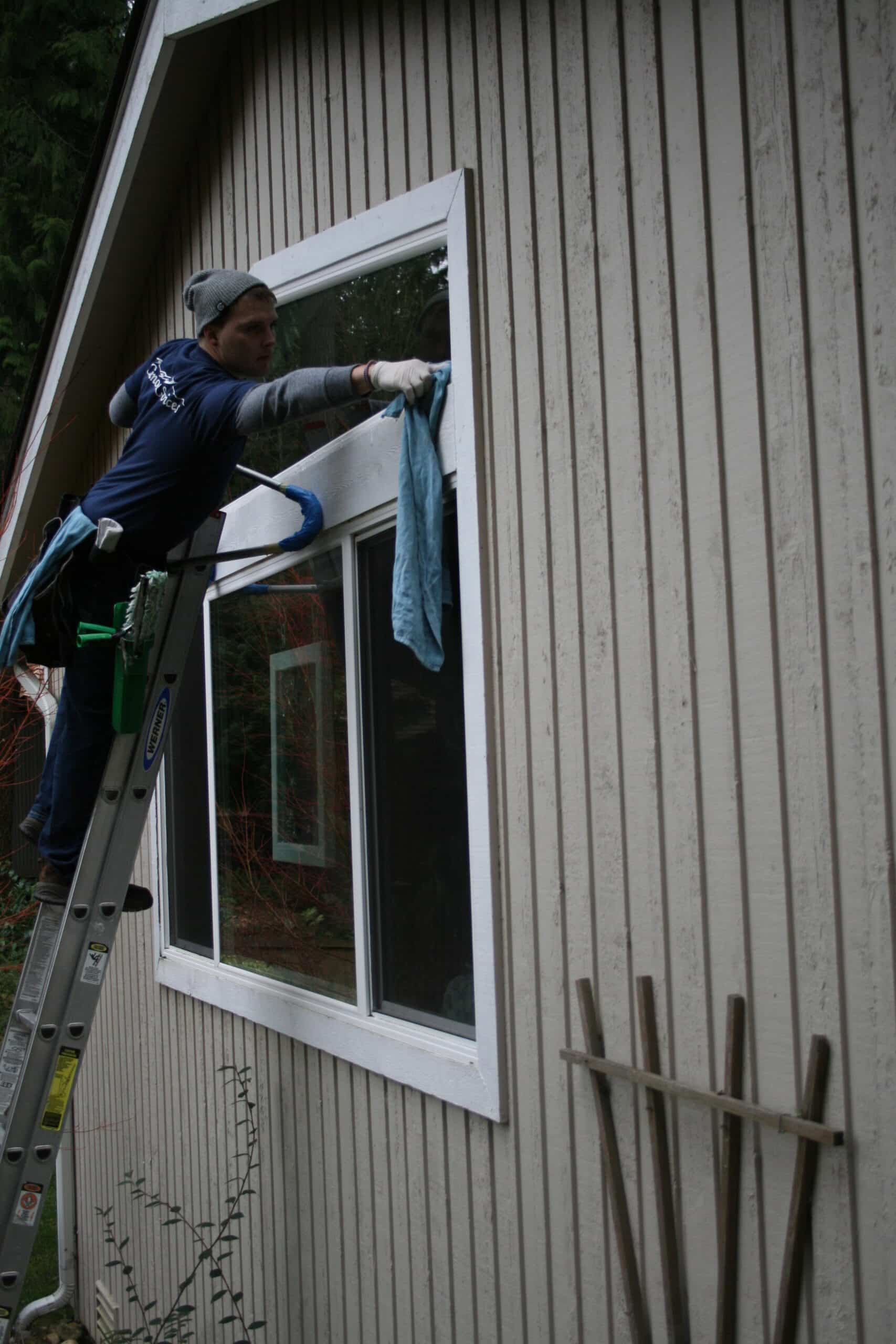 Cleaning exterior window in Novlety Hill