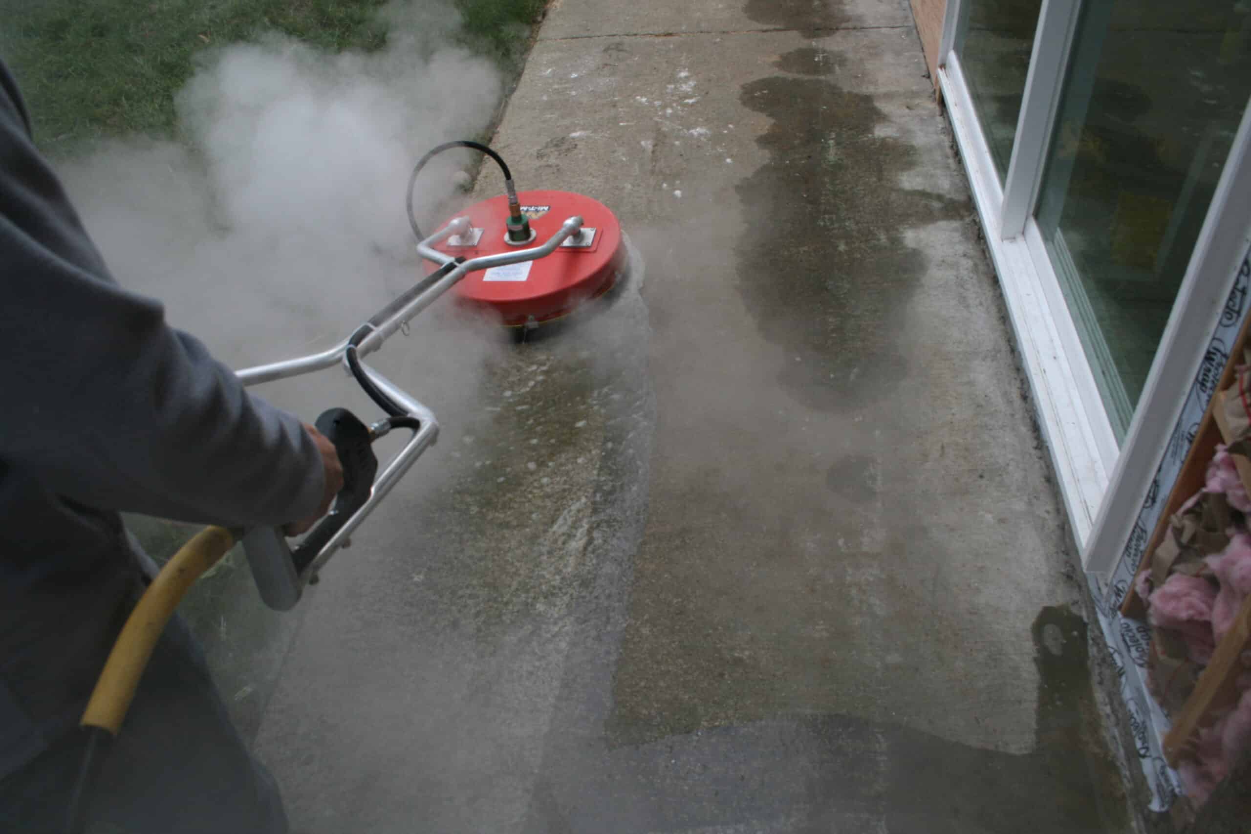 Removing years of build up off patio using pressue washing in Mt Vernon, WA