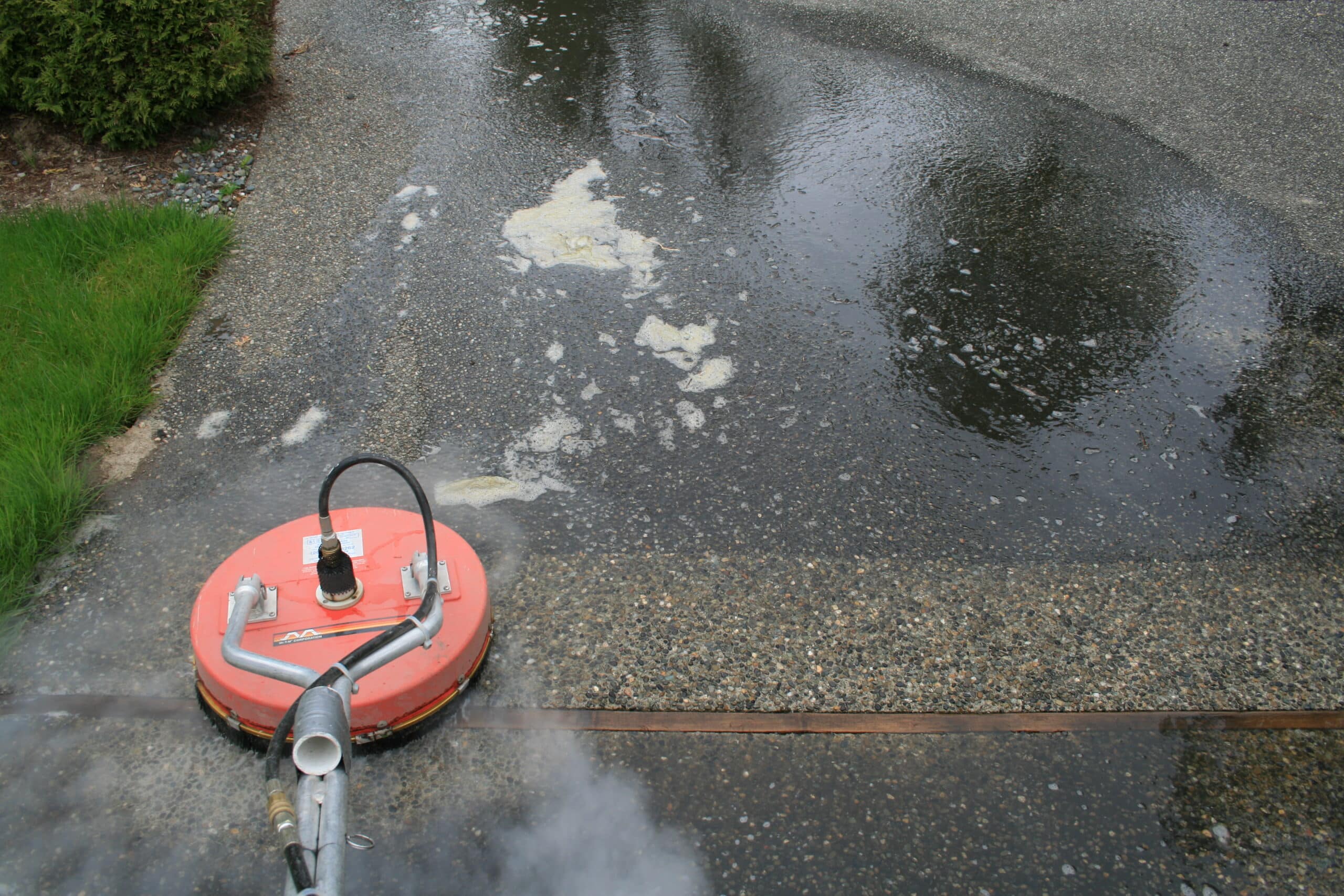 Pressure washing service cleaning patio in Mukilteo, WA