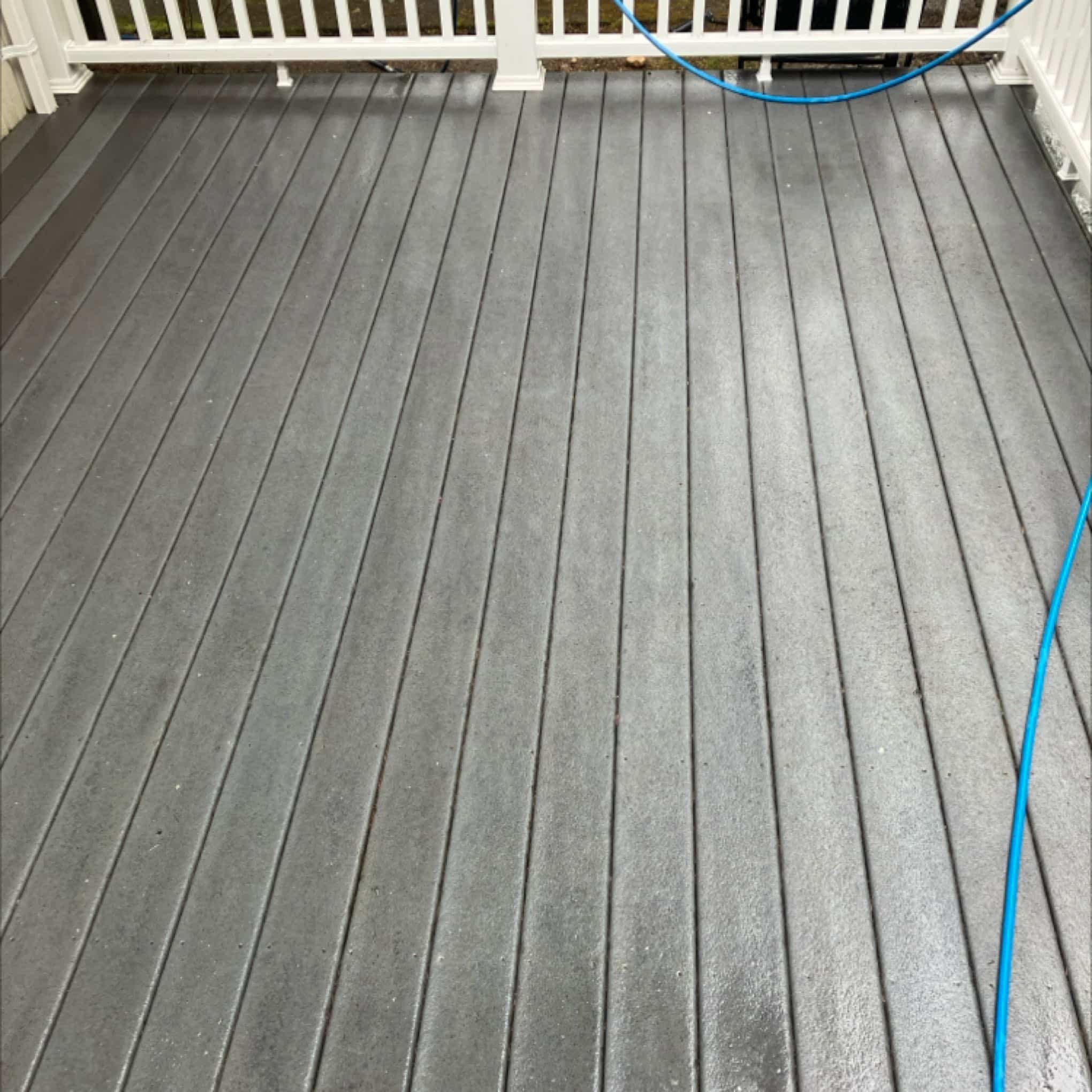 Pressure washing deck in Redmond, WA