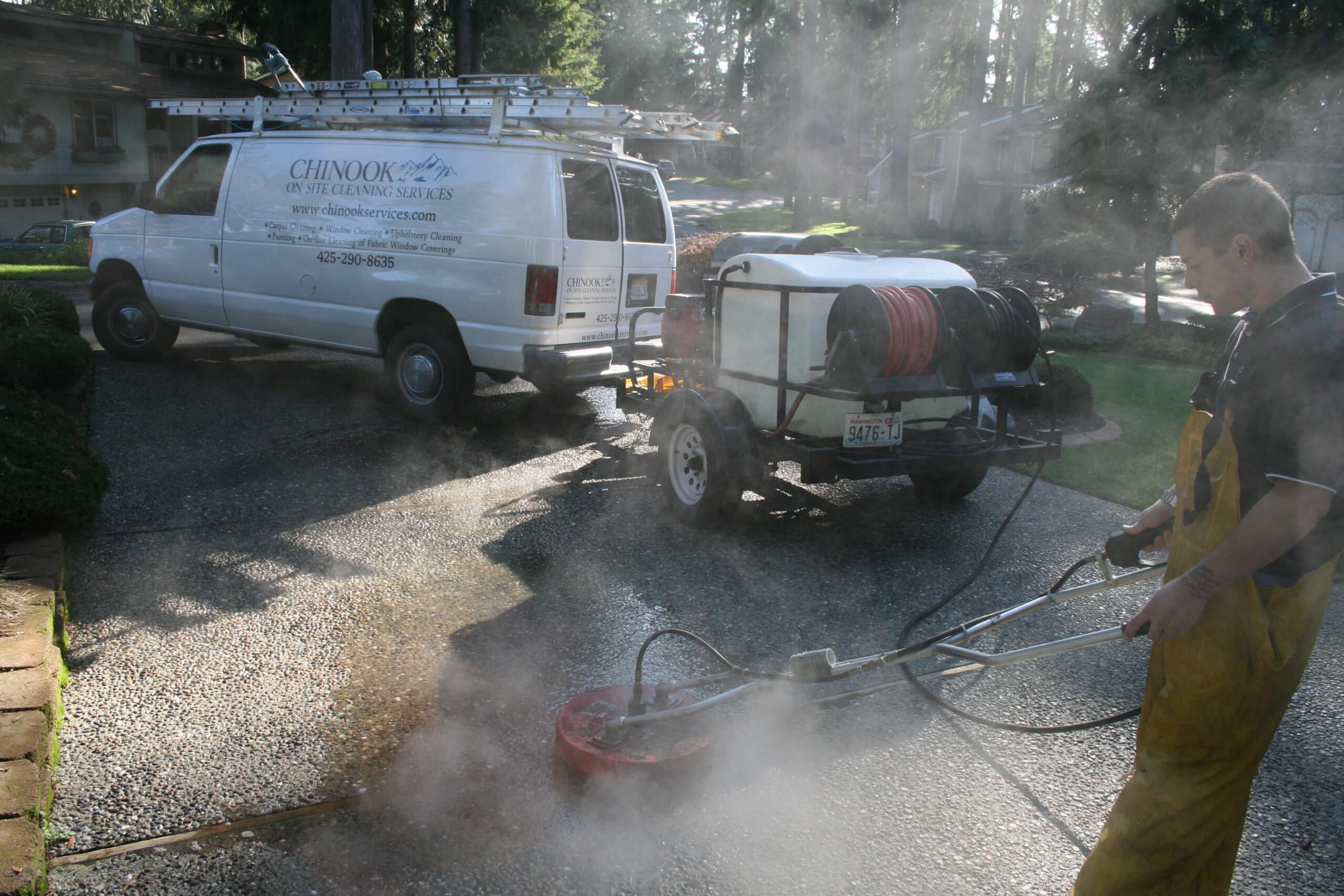 Pressure washing homes concrete in Sahalee community