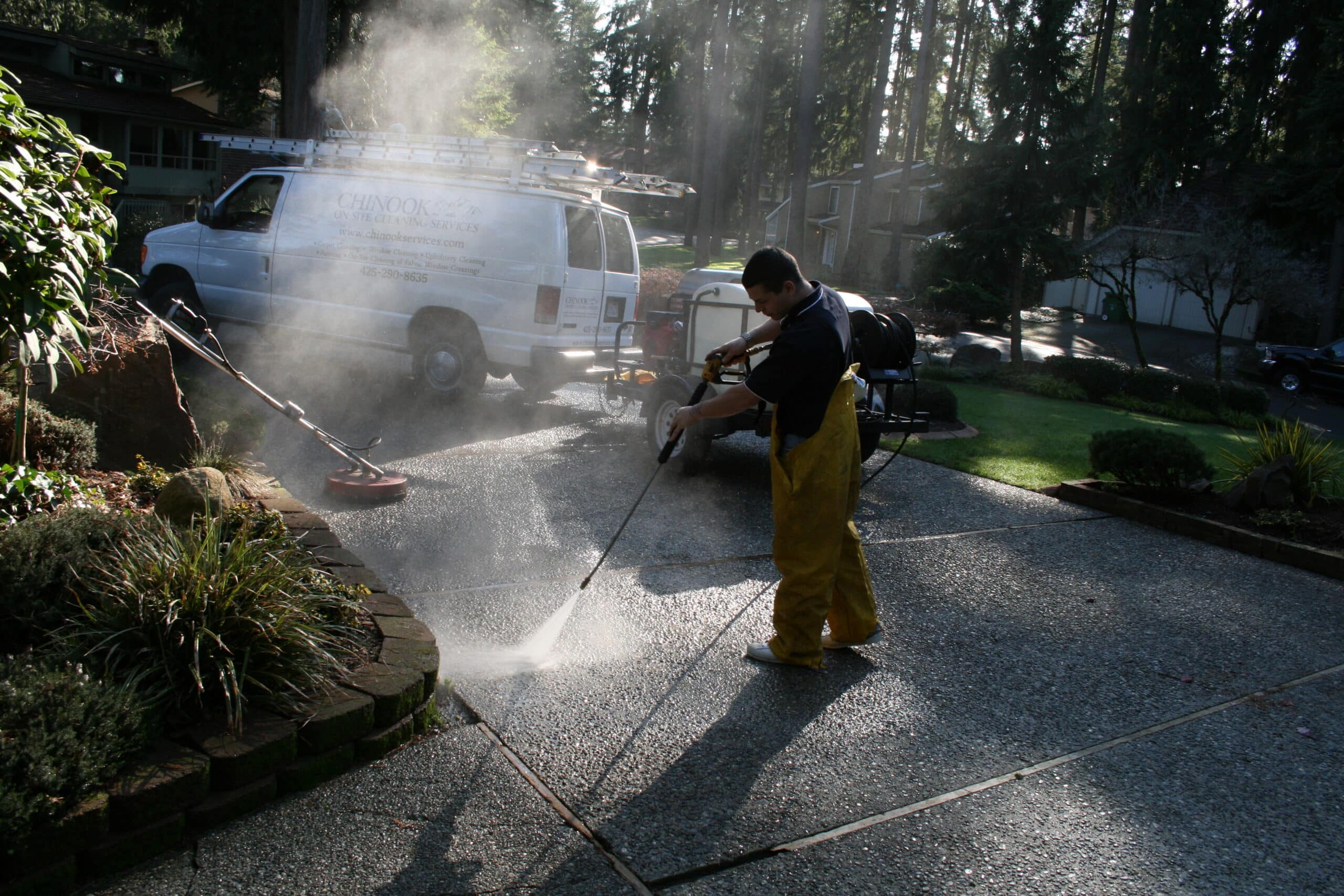 Pressure washing concrete driveway in Snohomish, WA