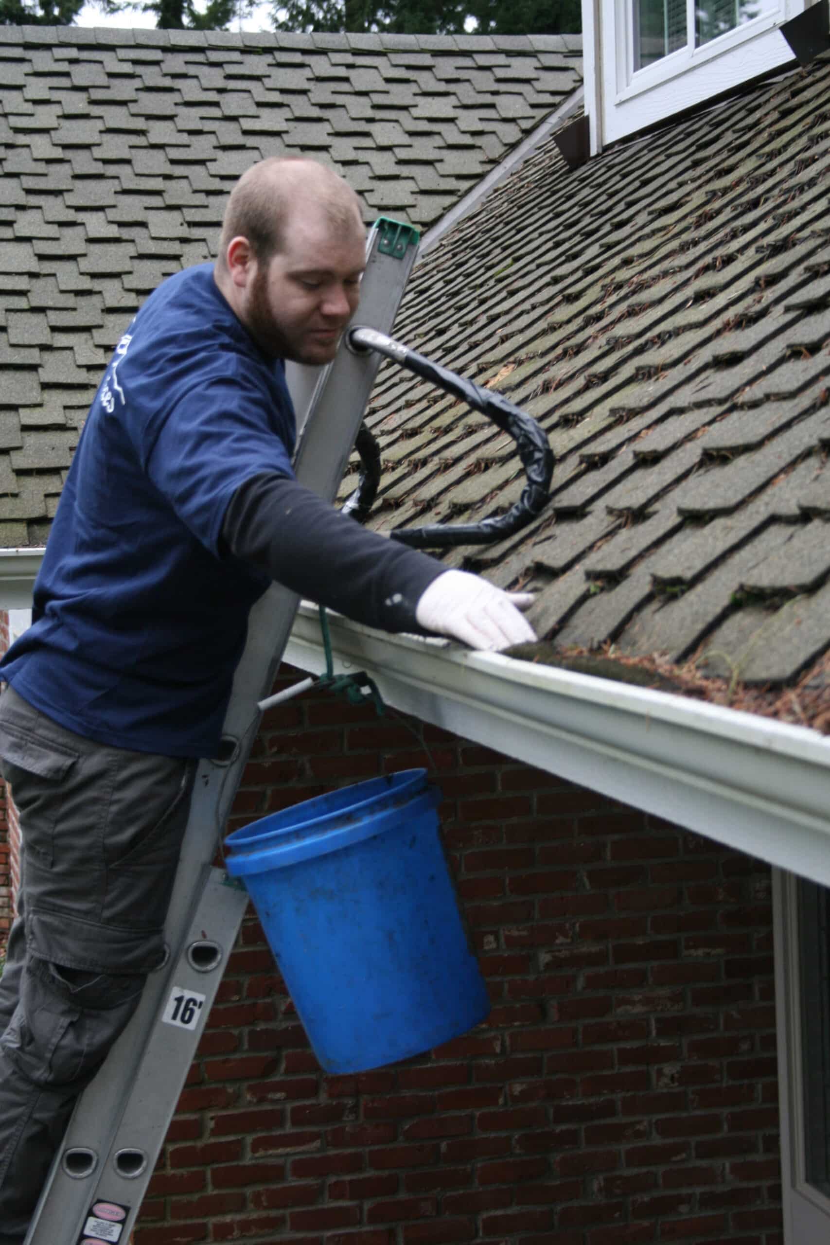 Hand cleaning gutters Woodinville