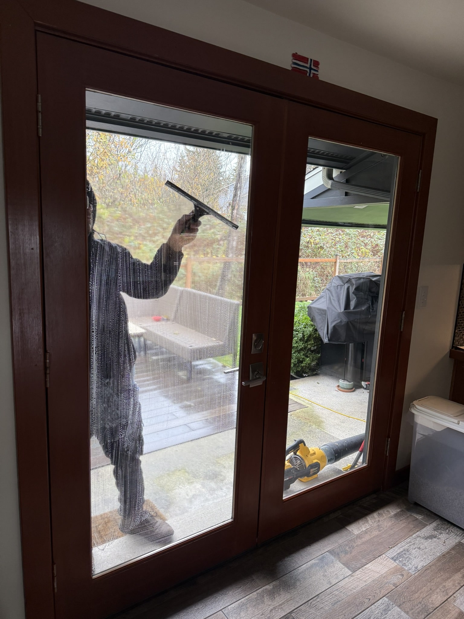 Cleaning window in Martha Lake WA